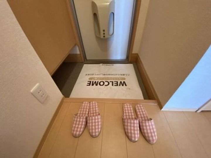 カーサ城北 C棟101の玄関