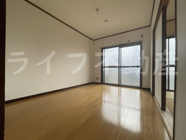 コスモシティ坂口302の居間