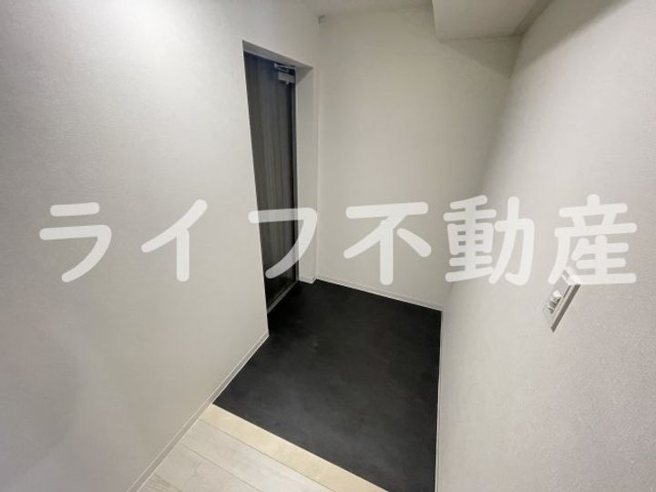 プレサンスNEO新深江リュミエルの玄関