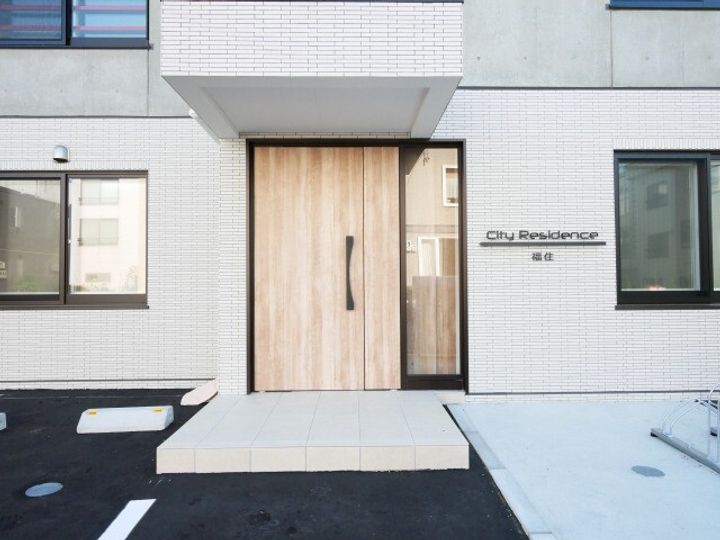 北海道札幌市豊平区西岡五条1丁目(マンション)の賃貸物件の玄関