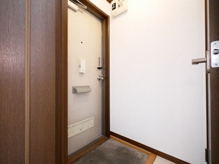 北海道札幌市手稲区曙五条1丁目(マンション)の賃貸物件202の玄関