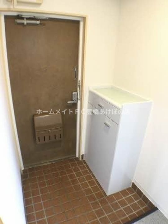 ハイツサンスカイ503の玄関