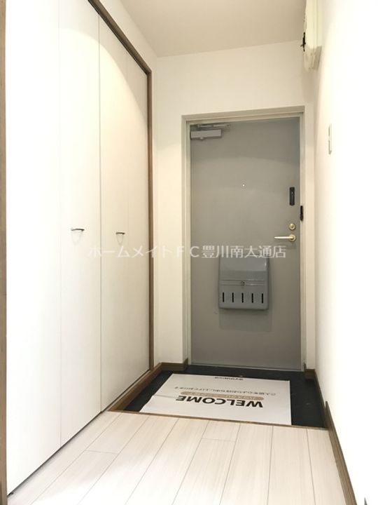 愛知県豊川市弥生町2丁目(マンション)の賃貸物件105の玄関