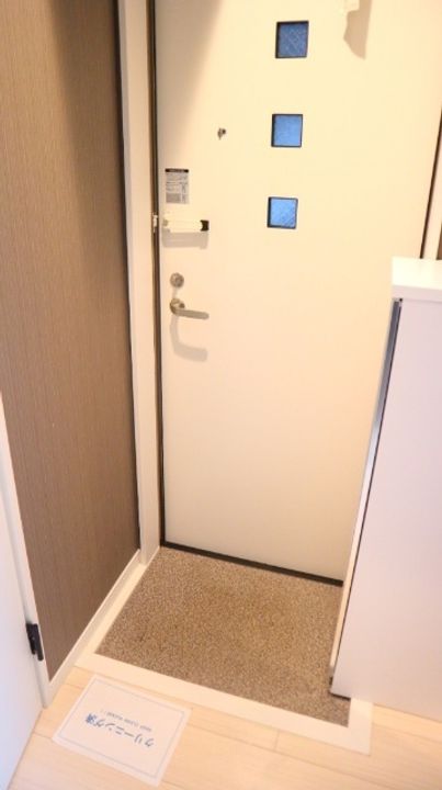 プライムステージ草加101の玄関