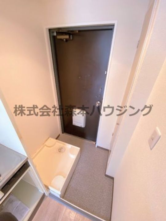 プレアール星田 102の玄関