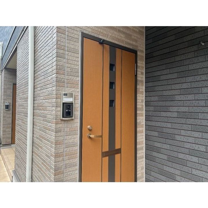 旭ヶ丘KOホームズの玄関