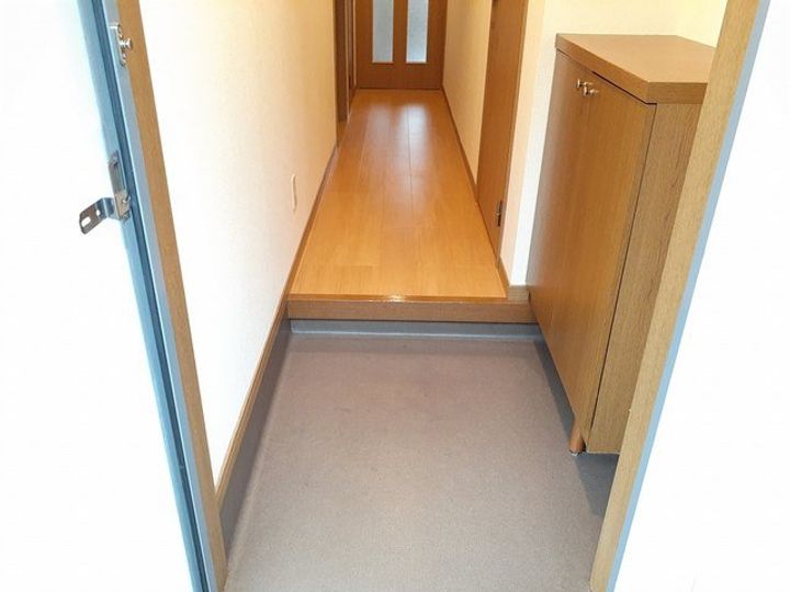 富山県高岡市江尻(マンション)の賃貸物件の玄関