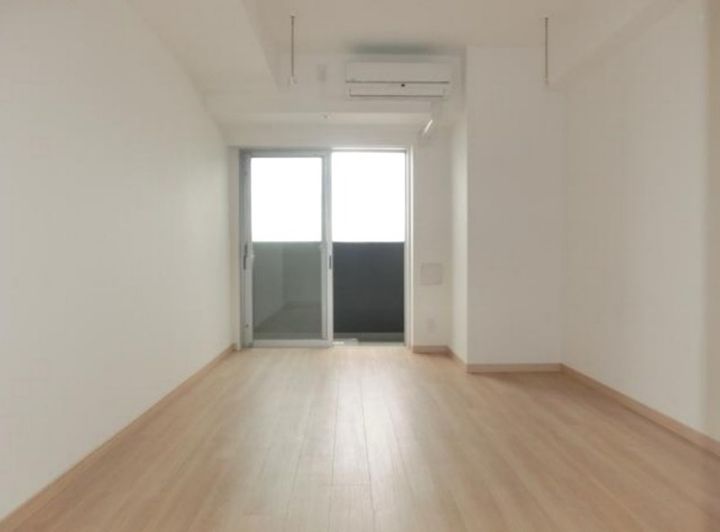 東京都新宿区百人町1丁目の賃貸マンションの居間