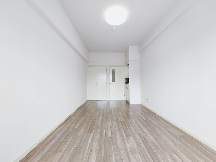 グランドハイム朝生田302の居間