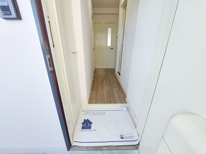 グランドハイム朝生田302の玄関