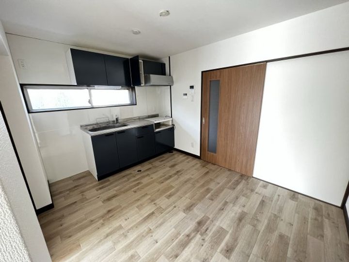 メゾンドール横河原101の居間