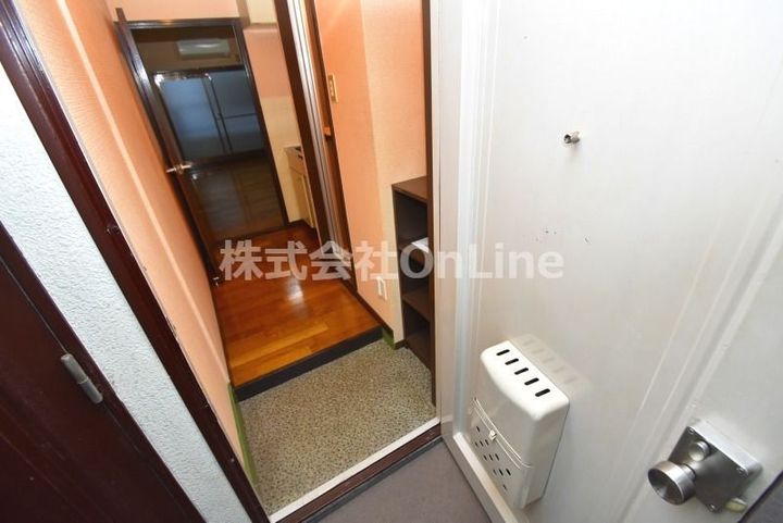 ハーモニーハイツ花園本町の玄関