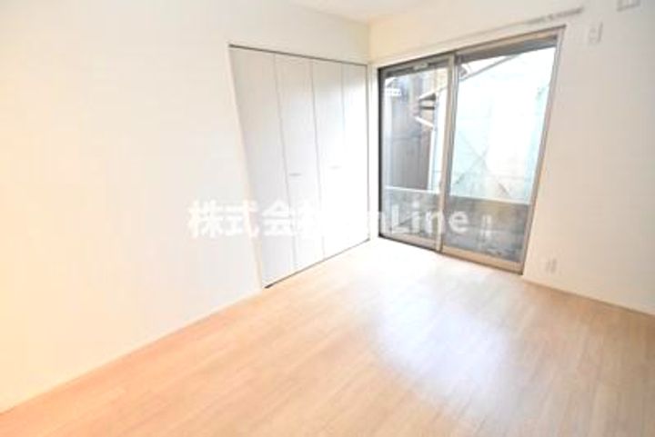 Comodo Residencia八尾南の寝室