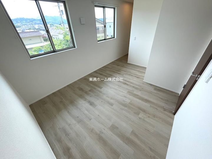 フォレスト蟹ヶ坂202の寝室