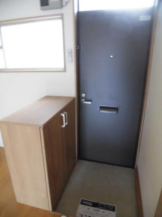 コーポ柳0201の玄関