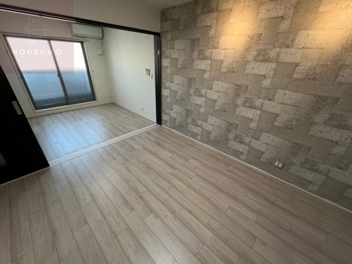 フジパレス俊徳道102の居間