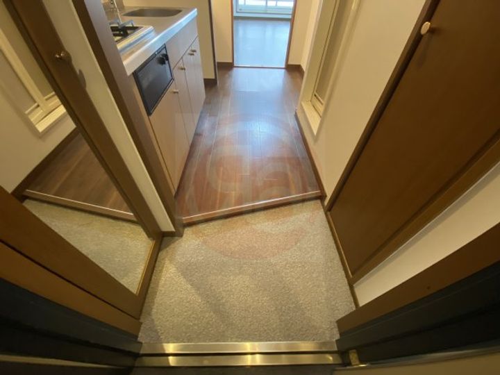 リバーライズ高井田307の玄関