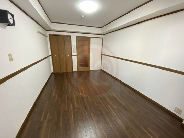 リバーライズ高井田307の寝室