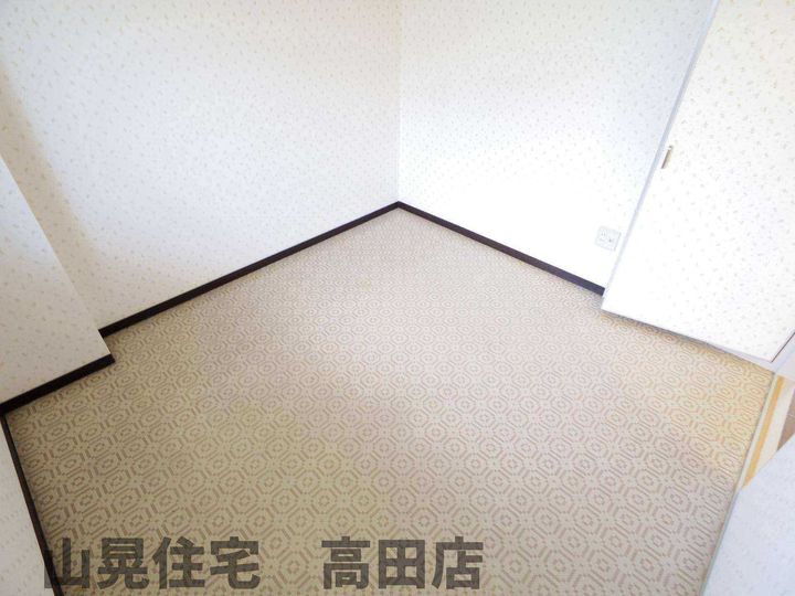 奈良県大和高田市西三倉堂1丁目(マンション)の賃貸物件の居間