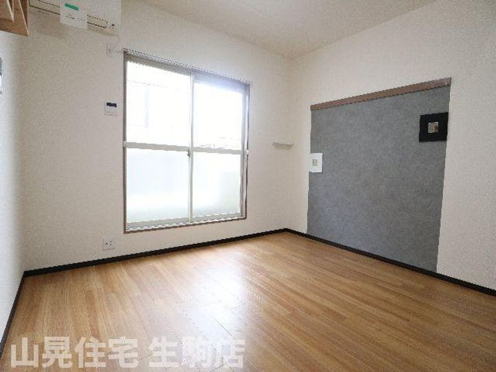 奈良県生駒市西旭ケ丘(アパート)の賃貸物件の居間