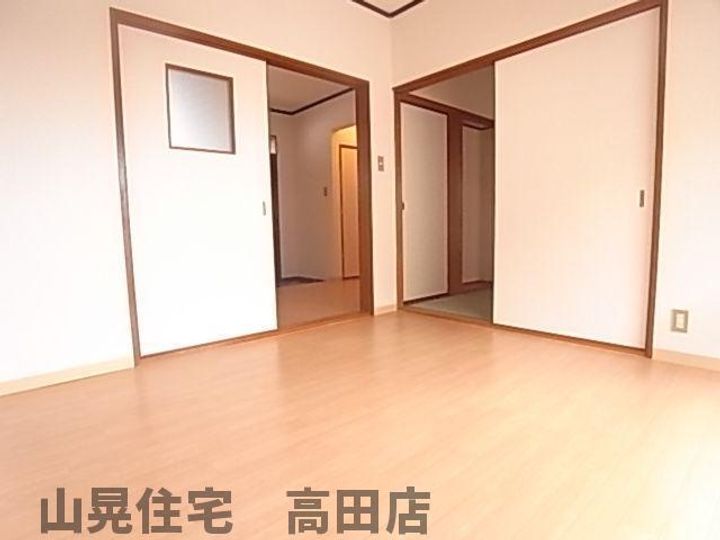 奈良県大和高田市大字築山(アパート)の賃貸物件の居間