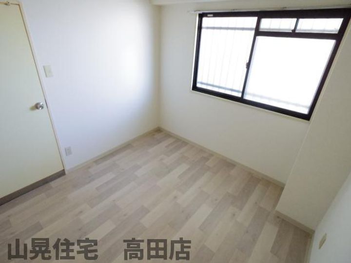 奈良県大和高田市神楽3丁目(マンション)の賃貸物件の居間