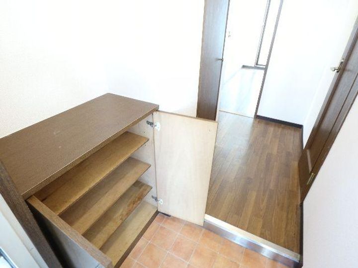 京都府相楽郡精華町光台6丁目(マンション)の賃貸物件の玄関