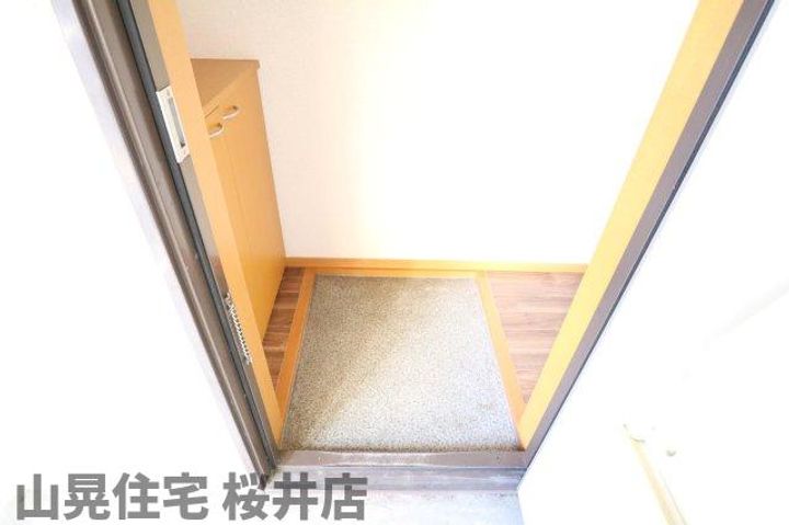 サンホワイト桜の玄関