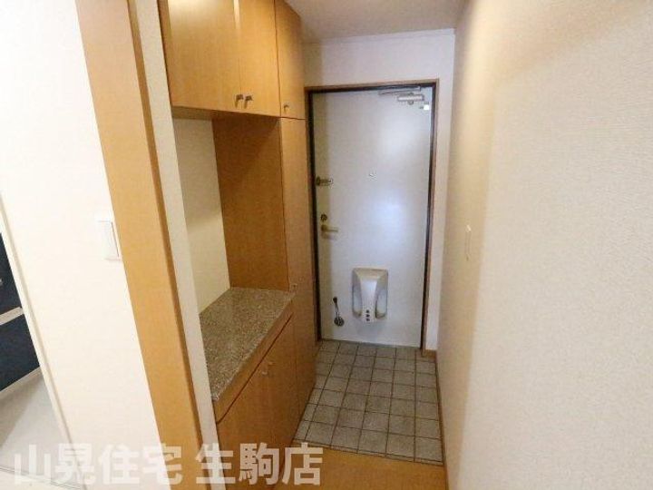 奈良県生駒市東松ケ丘(マンション)の賃貸物件302の玄関