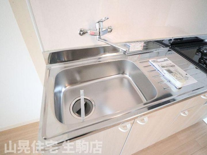 奈良県生駒市辻町(マンション)の賃貸物件303のキッチン