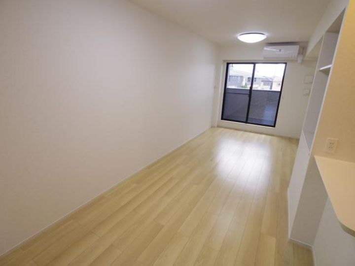 奈良県天理市櫟本町(アパート)の賃貸物件の居間