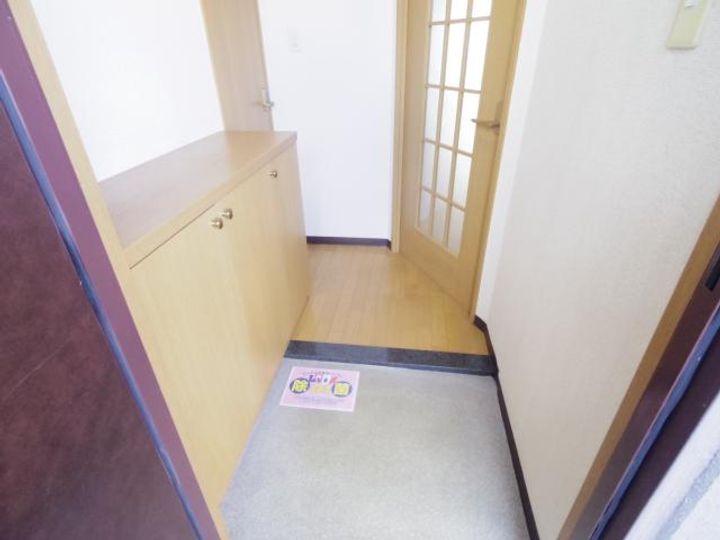 奈良県天理市前栽町(マンション)の賃貸物件の玄関