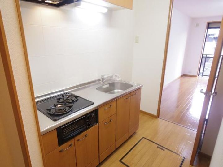 奈良県天理市櫟本町(マンション)の賃貸物件のキッチン
