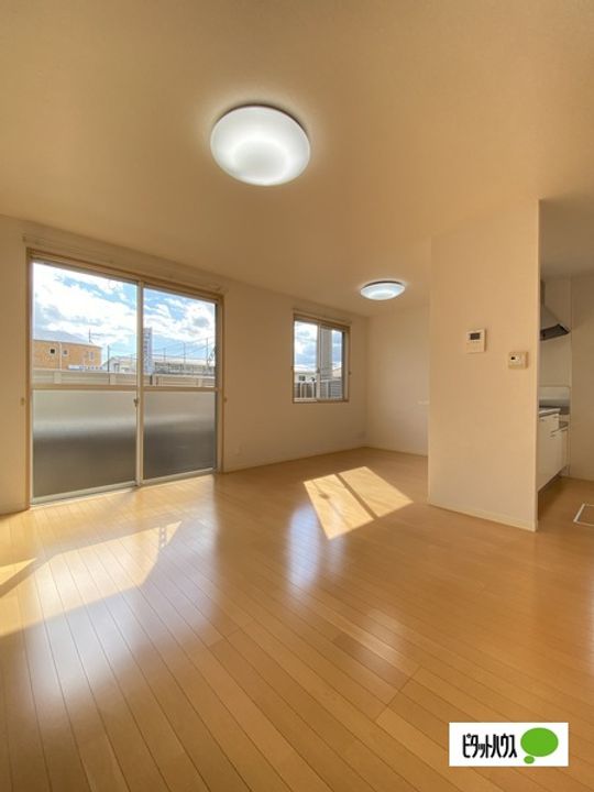 シャーメゾン下津野の居間