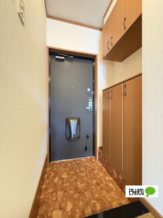 サザンコート26105の玄関