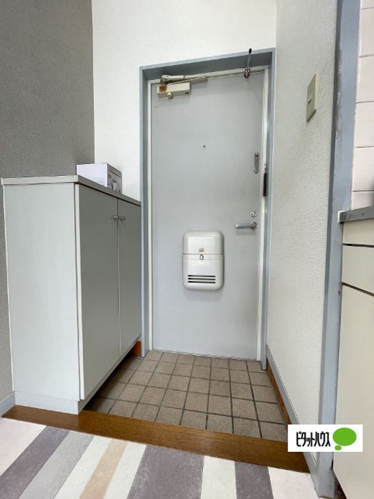 メゾンフェリス栄谷A122の玄関