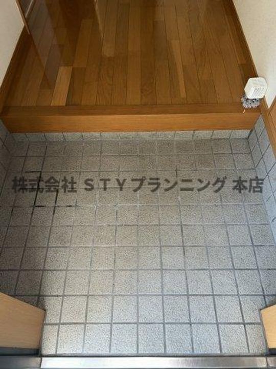 ボヌール岩崎台A棟の玄関