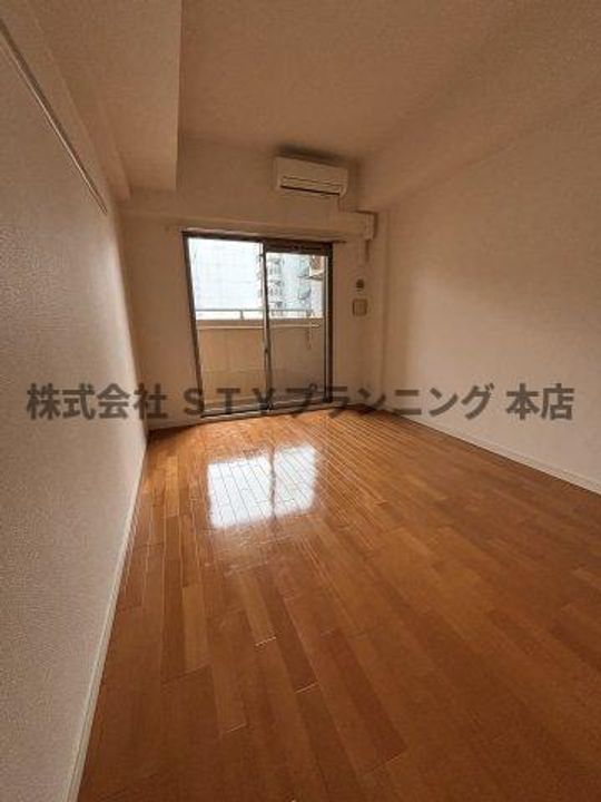 プレサンス泉セントマークの居間