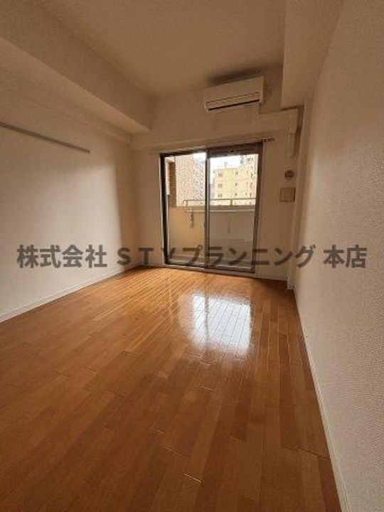 プレサンス泉セントマークの居間