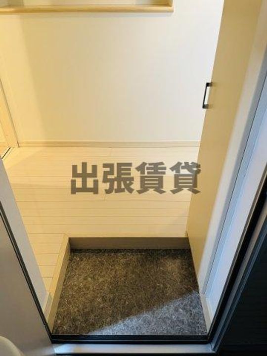 バウコーポ栄生の玄関