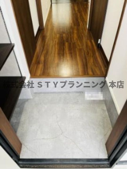 レジデンス重原駅前の玄関