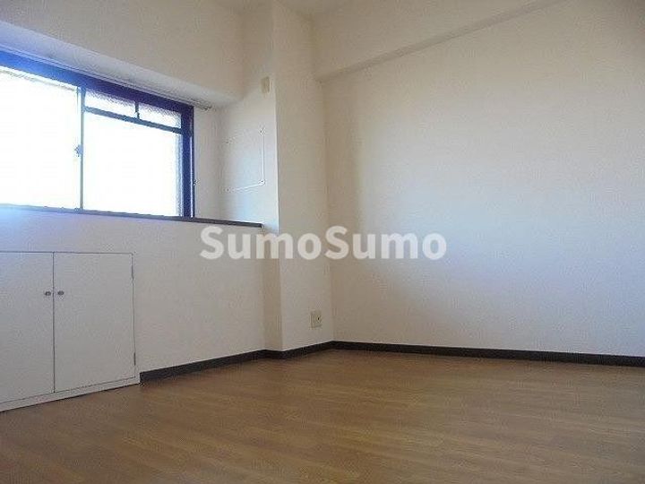 ロイヤルコーポ明石硯町の寝室