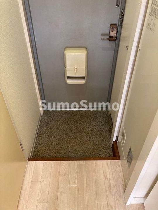 カーサ王塚台の玄関