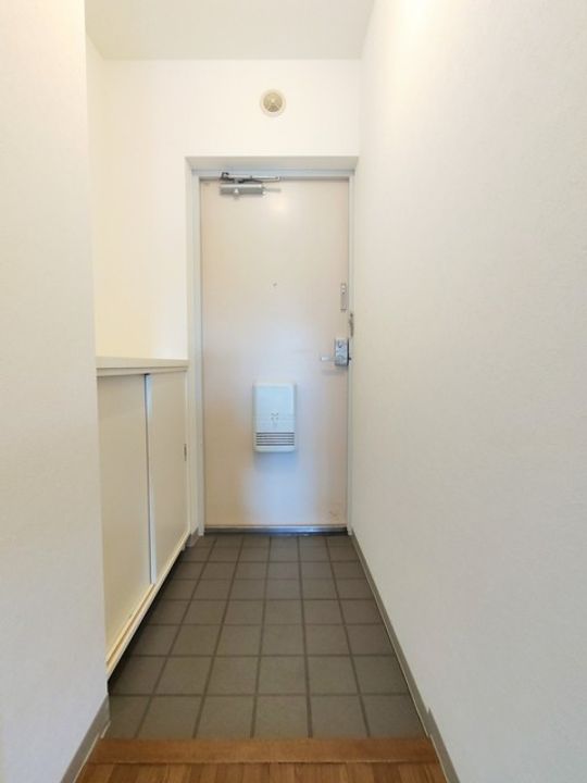 ベルデュール麻生壱番館の玄関