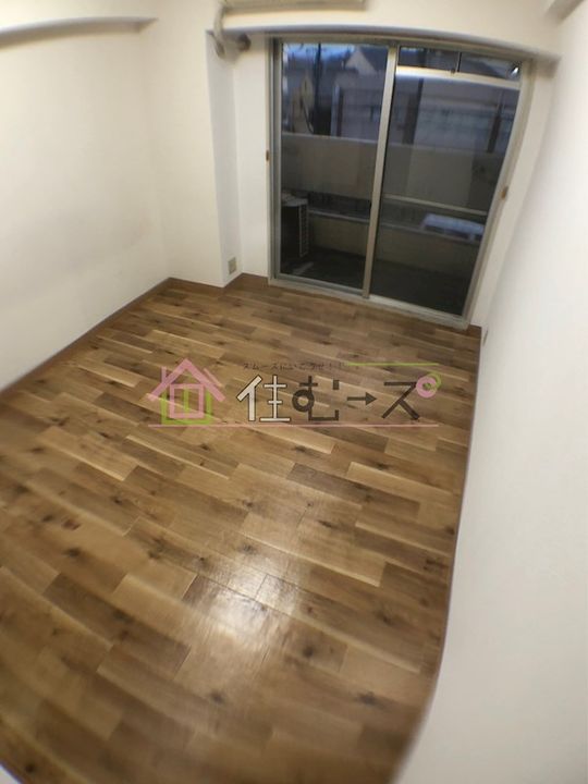 ダイドーメゾン上新庄の寝室