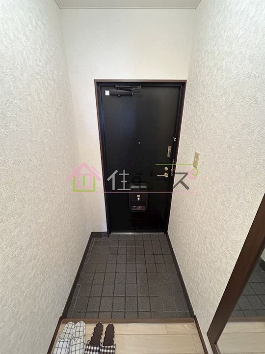 マイプラザ田島の玄関
