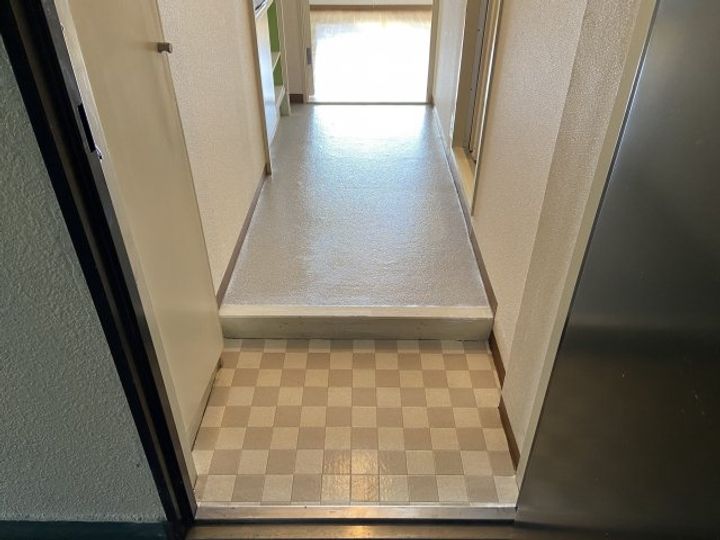プラザ出水通301の玄関