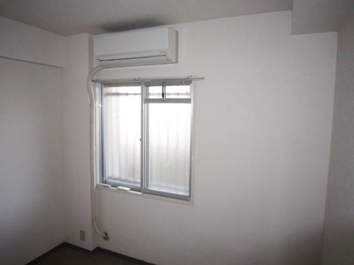 水鉄アーバンコンフォート岩出の寝室