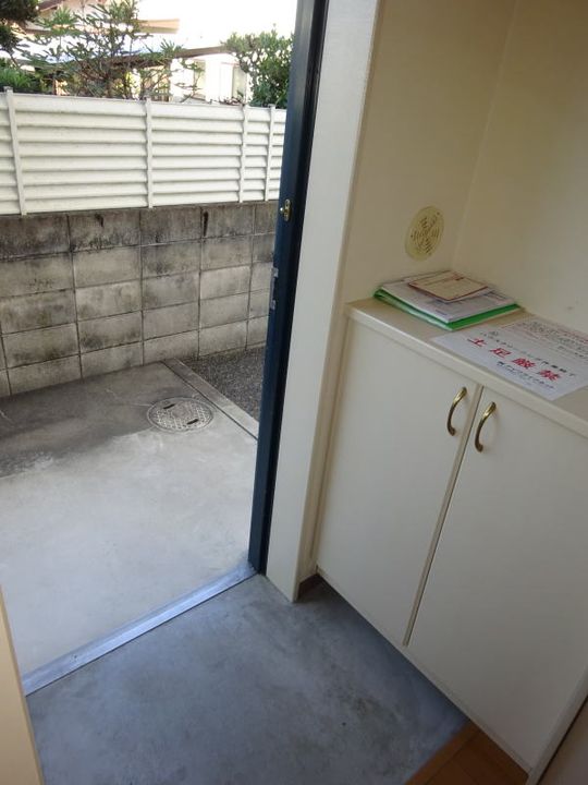 コスモコートコサコの玄関