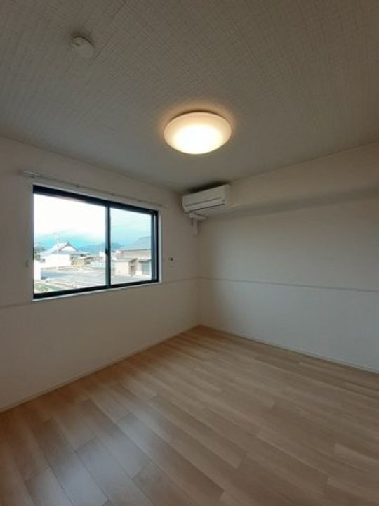 クラール綾川A0102の寝室